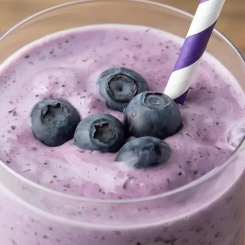 Anti-Inflammatory Blueberry Smoothie 2 Anti-inflammatory blueberry smoothie with fresh blueberries and green ingredients